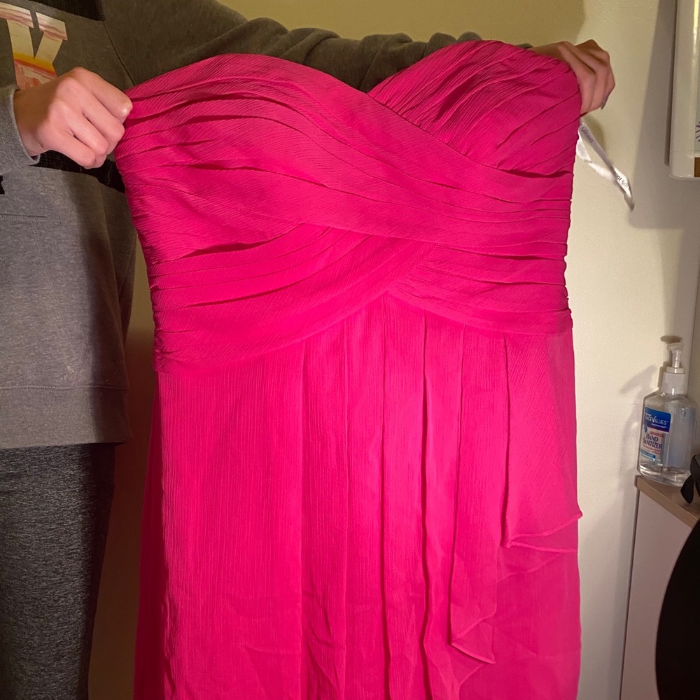 Short hot pink David’s Bridal bridesmaid dress